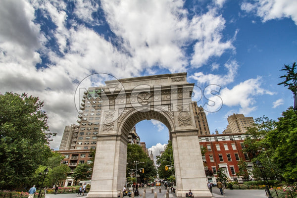 arch in Washington Square Park on beautiful summer day with blue sky