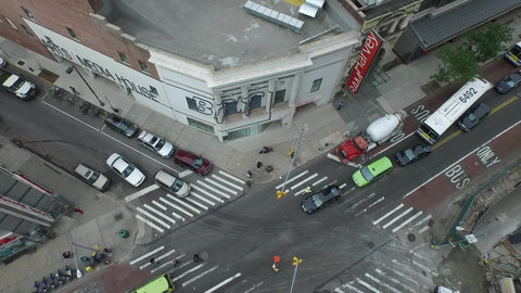 rising above busy corner on the Lower East Side of Manhattan