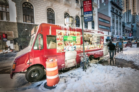 snack truck in Manhattan in winter - snow on ground in street