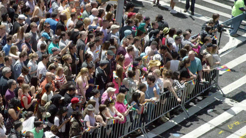 Gay Pride Day in Manhattan - crowd of LGBT supporters with flags in New York City