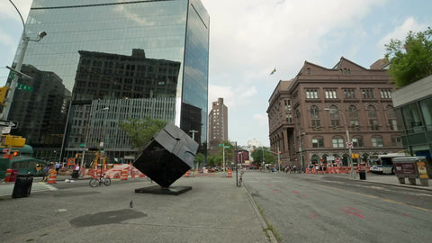 360 degree view of Cooper Square - panning famous cube sculpture and people walking on summer day