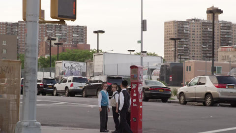Jewish children playing on street corner in Brooklyn - young Hasidim hanging out on the block