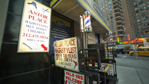 famous Astor Place barbershop sign with spinning barber pole on Broadway in Manhattan NYC
