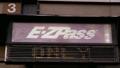 driving under E-ZPass toll sign - closeup