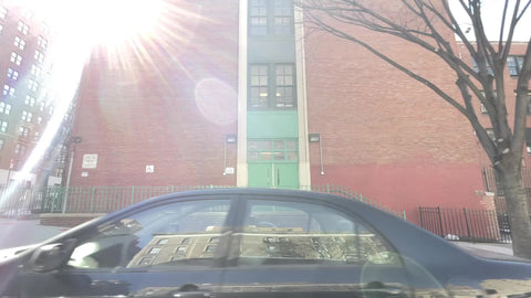 driving through Upper West Side of Manhattan sunny winter day New York City NYC