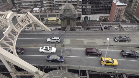 aerial view of cars driving on Queensboro Bridge from tram moving in slow motion 1080 HD in NYC