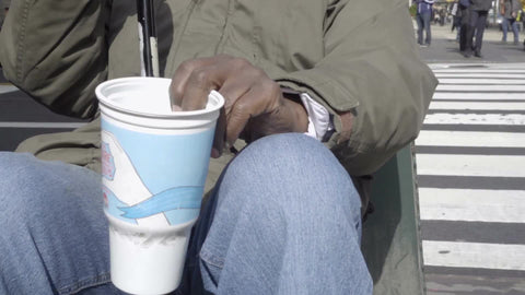 homeless old man shaking cup on Park Avenue begging for change in slow motion 1080 HD in NYC