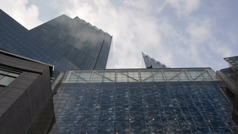Time Warner Center Towers in Columbus Circle tilting down to sign in NYC