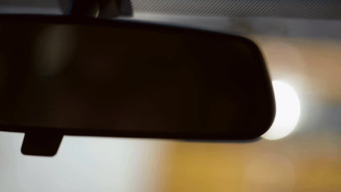 rearview mirror from driver pov - close up
