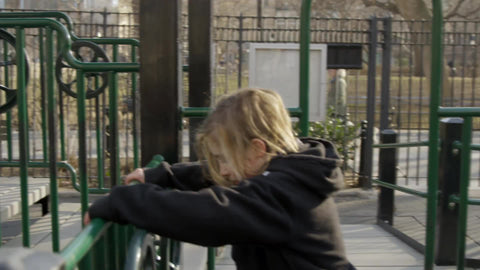 children playing on playground on jungle gym structure in Washington Square Park on sunny day in winter in 4K and 1080 HD in NYC