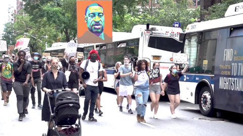 diverse people marching in support of Black Lives Matter in New York City