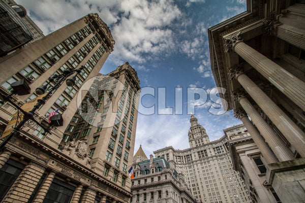 Manhattan Municipal Building in Downtown NYC - civic courthouse with blue sky and clouds on spring day