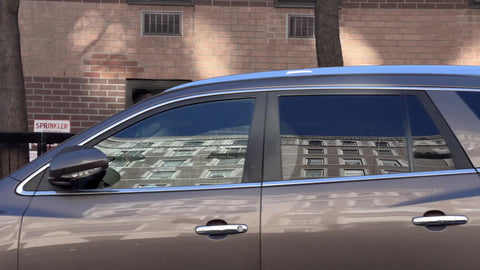 Harlem scene driving up block uptown with shops and stores people working walking talking New York City NYC