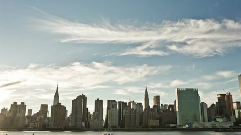 panning across Manhattan skyline on beautiful day in New York City NYC