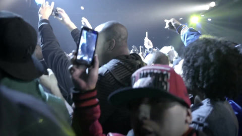 crowd watching and recording Mobb Deep on stage - Prodigy and Havoc rapping at show