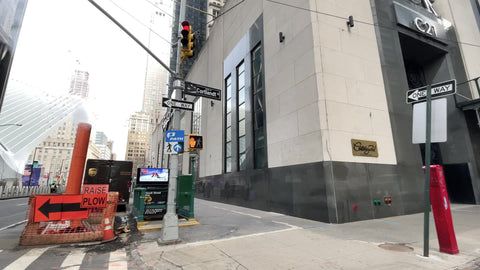 orange steam pipe with smoke on construction site with arrow sign on Church Street Downtown Manhattan New York City NYC
