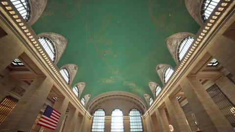 two women descending downstairs in Grand Central Station in NYC