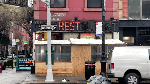 restaurant sign on 6th Ave in Manhattan New York City NYC