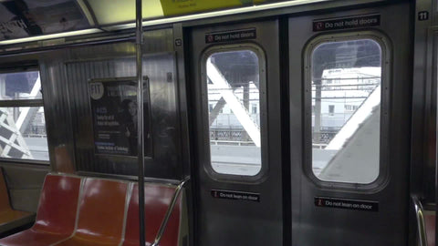 elevated subway train interior, panning across empty seats inside carriage in 1080 HD in NYC
