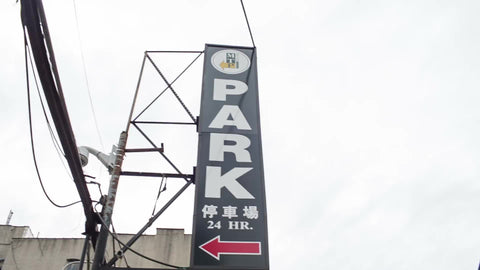 Chinatown parking lot with Freedom Tower in distance