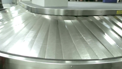 closeup of LaGuardia Airport baggage claim conveyor belt