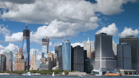 Downtown Manhattan skyline with Freedom Tower and skyscrapers - 4K timelapse during day in NYC