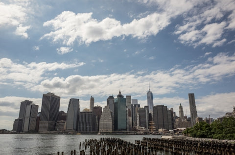 Manhattan skyline Downtown New York City with wood dowels on East River NYC