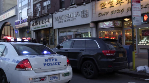 police car in Chinatown - driving past NYPD cops double parked with flashing lights in slow motion 4K and 1080 HD in NYC