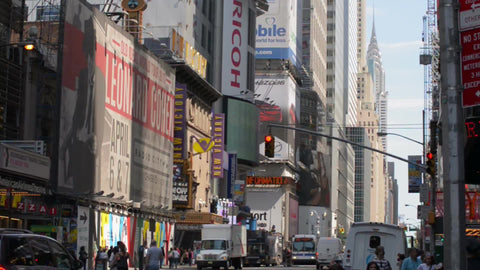 Chrysler Building view from busy Times Square on bright sunny summer day in 1080 HD in NYC