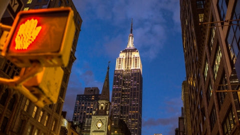 don't walk light and Empire State Building at night in Manhattan NYC