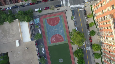 aerial shot overhead Harlem basketball court - rotating