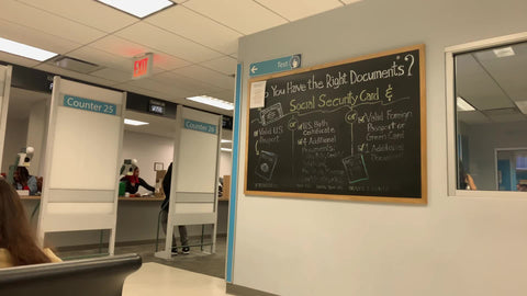 do you have the right documents sign - interior DMV people waiting New York City NYC