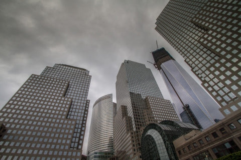 Freedom Tower under construction on gloomy cloudy day in Battery Park in Lower Manhattan