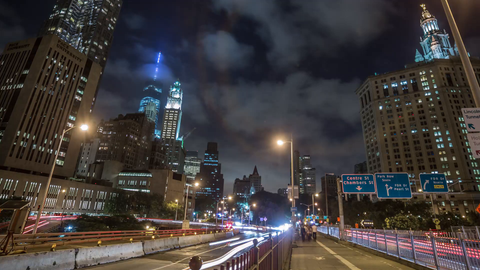 Downtown Manhattan at night coming off Brooklyn Bridge to FDR Drive - 4K timelapse in New York