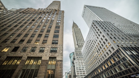 Chrysler Building in Midtown Manhattan - upward angle in early evening on summer day