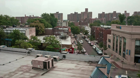 subway view of tenement buildings in the Bronx - elevated train in NYC