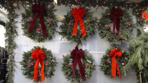 Christmas Wreaths on cold winter day - holidays in Chelsea - Santa Claus balloon in NYC