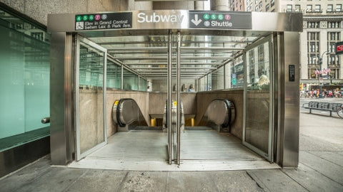 subway entrance on 42nd street and Lexington Ave on East Side of Manhattan - down escalators to train station in Midtown Manhattan