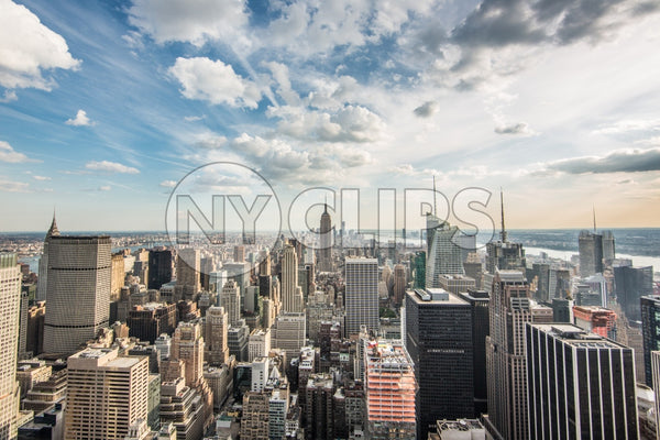 Empire State Building and Manhattan cityscape on bright sunny day with skyscrapers from high view