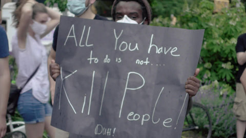 all you have to do is not kill people sign at BLM rally in New York City