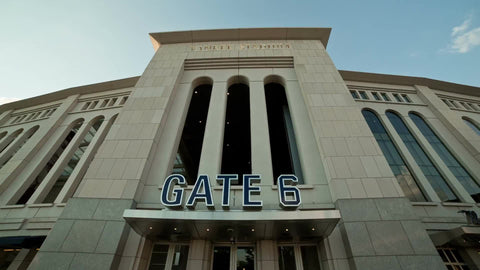 Gate 6 sign at Yankee Stadium tilting down to entrance - exterior front doors in the Bronx New York City