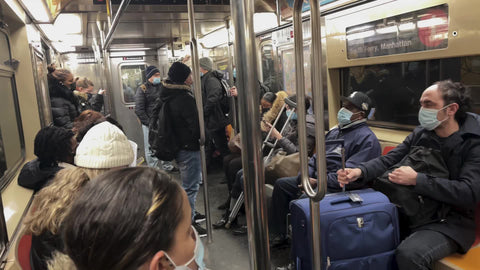 passengers with masks interior 1 train subway carriage people commuting New York City NYC