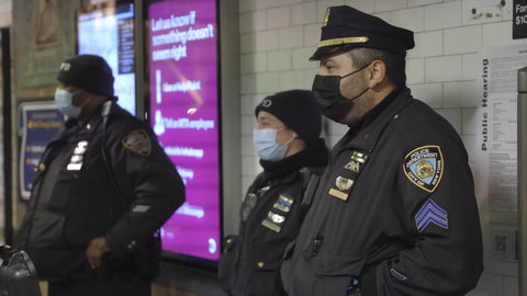NYPD police officers with masks in subway station - cop in mask in train New York City NYC