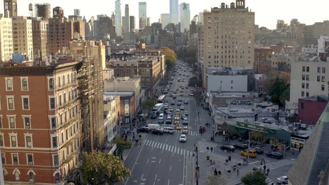 aerial moving over 6th ave traffic and cars Manhattan New York City NYC