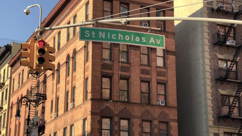 St Nicholas Avenue sign aka Saint Nick Ave above K&N Grocery in Harlem New York City NYC