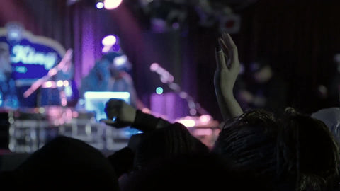 DJ Funkmaster Flex onstage at hip hop concert - fans watching music show