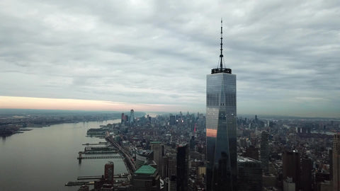 Freedom Tower with Empire State Building in background high aerial view Manhattan cityscape New York City NYC