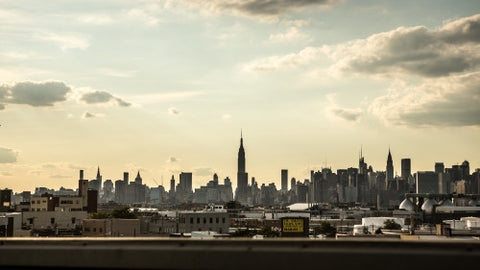 Manhattan skyline - city view with Empire State Building seen from Brooklyn in NYC