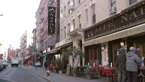 Little Italy cafe and restaurant on street - driving on fall day in NYC