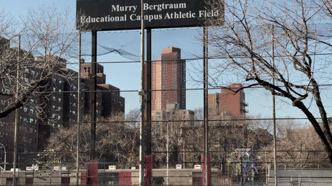 Murry Bergtraum School Educational Campus Athletic Field fence in LES Lower East Side Downtown Manhattan New York City NYC